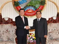 Chủ tịch nước bắt đầu thăm hữu nghị chính thức Lào