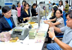 Tái cấu trúc hệ thống ngân hàng thương mại bắt đầu từ giải quyết nợ xấu