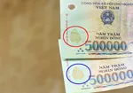Ngân hàng Nhà nước khuyến cáo người dân nên kiểm tra kỹ giao dịch tiền mặt