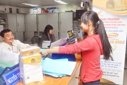 Quận 1 ra mắt dịch vụ phát trả kết quả hồ sơ hành chính tận nhà và đóng phạt vi phạm hành chính qua bưu điện