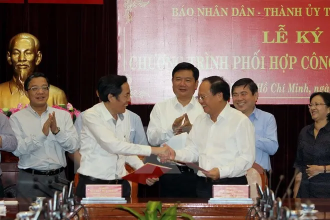 Thành ủy TP.HCM và báo Nhân dân ký kết chương trình phối hợp công tác giai đoạn 2016 - 2020