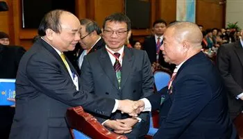 Thủ tướng tiếp đoàn kiều bào về nước đón Tết