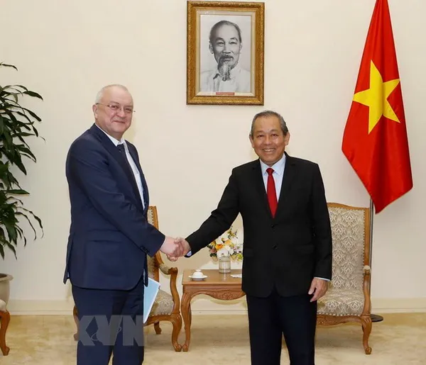 Phó Thủ tướng Trương Hòa Bình tiếp ông Alexander Anikin.