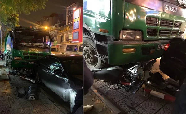 Hiện trường tai nạn xe rác đâm xe máy dừng đèn đỏ - Ảnh VTC