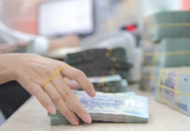Tiền gửi của người dân vào ngân hàng tăng, liên tục phá kỷ lục 1