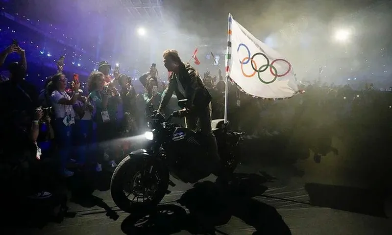 tom-cruise-riding-out-of-the-paris-olympics-closing-ceremony-v0-kldj4jz3a5id1