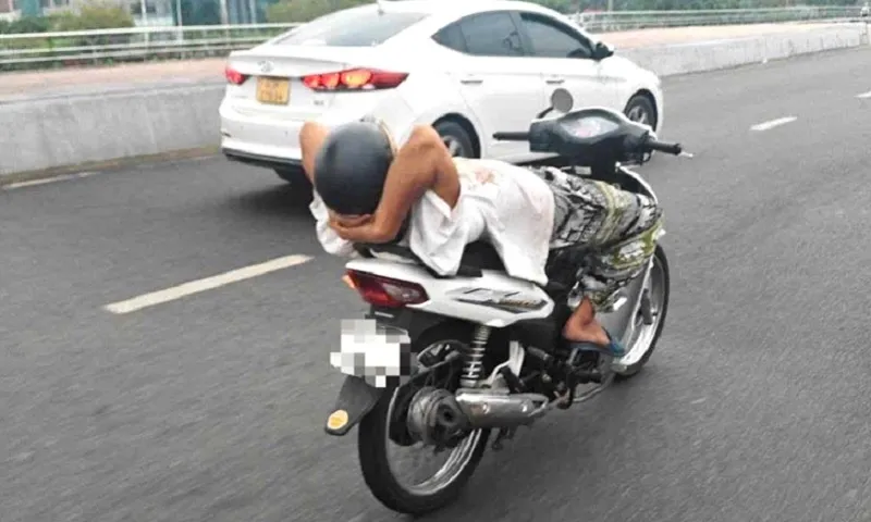 Đà Nẵng: Xác minh vụ nam thanh niên thả hai tay lái xe trên cầu Rồng