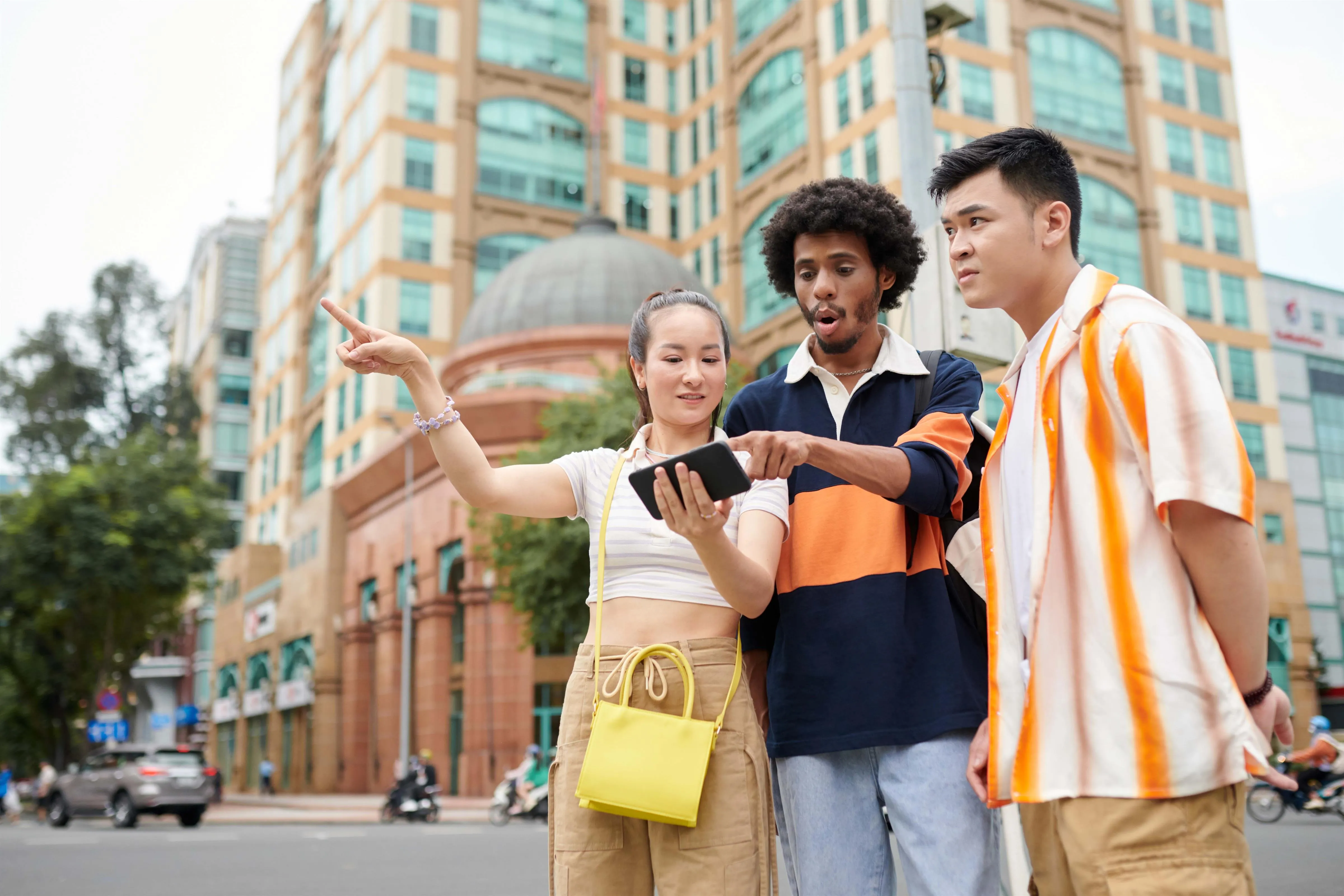 lost-friends-using-map-on-smartphone-2025-02-11-12-52-22-utc