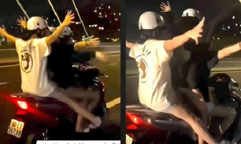 Thiếu nữ bị tịch thu xe SH vì buông 2 tay trên cầu Ba Son