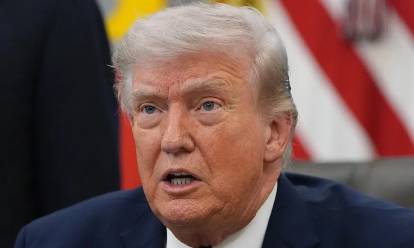 Tổng thống Trump phát biểu tại Nhà Trắng hôm 31-3. Ảnh AP