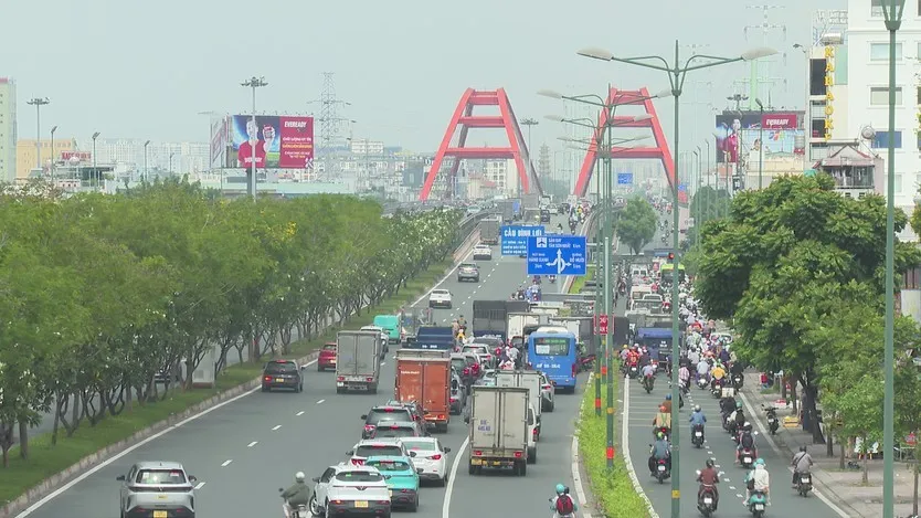 TP. Hồ Chí Minh dự kiến thí điểm làn đường ưu tiền dành riêng cho xe buýt - Ảnh 1