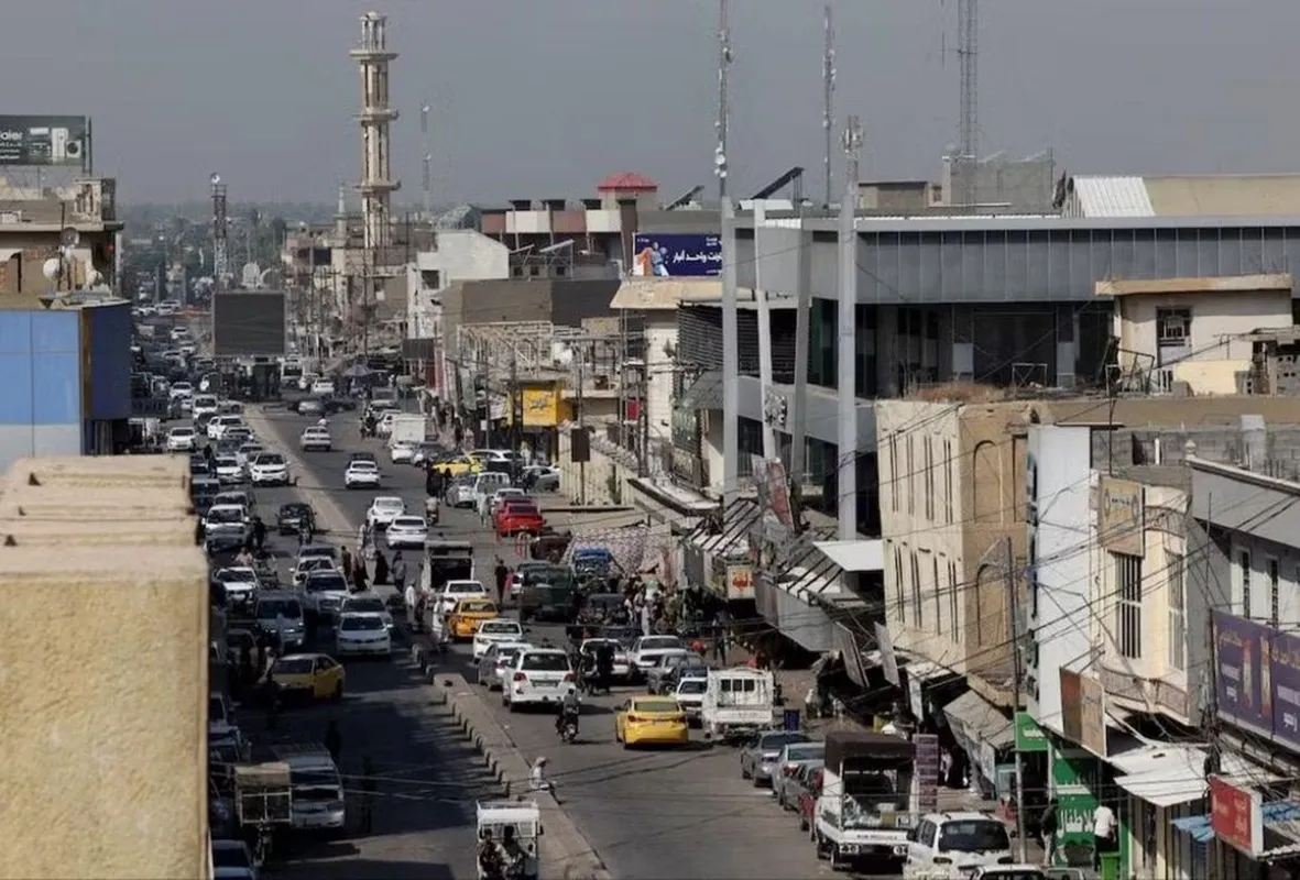 Trên đường phố Falluja ở Iraq ngày 27-9-2026 - Ảnh Reuters