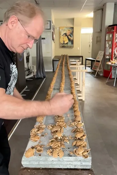 hammer-hands-crushing-walnuts.jpg