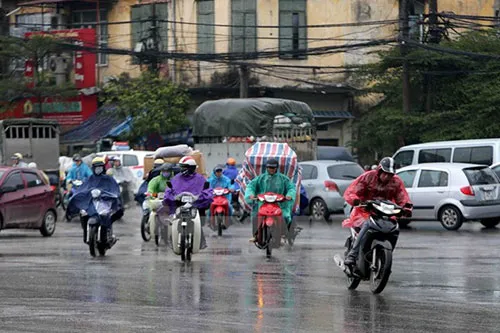 Dự báo thời tiết ngày mai 14/3: Hà Nội mưa rải rác, Sài Gòn nắng nóng