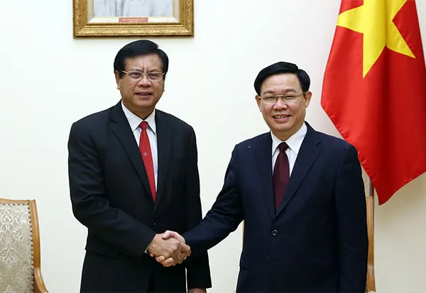 Phó Thủ tướng Vương Đình Huệ tiếp nguyên Thủ tướng Lào