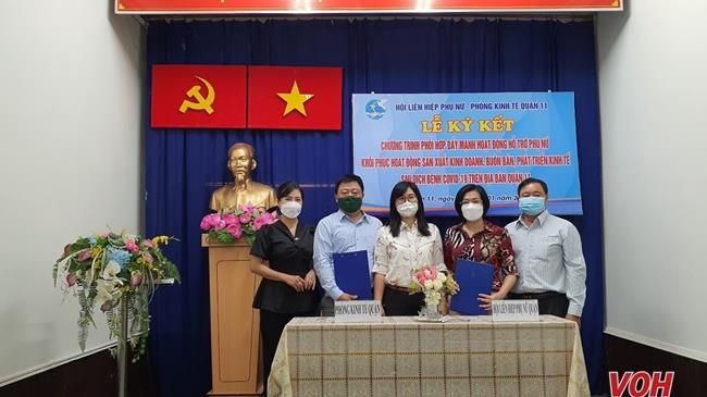Quận 11: Họp mặt phụ nữ mừng Xuân – Ký kết hoạt động hỗ trợ phát triển kinh tế sau Covid-19